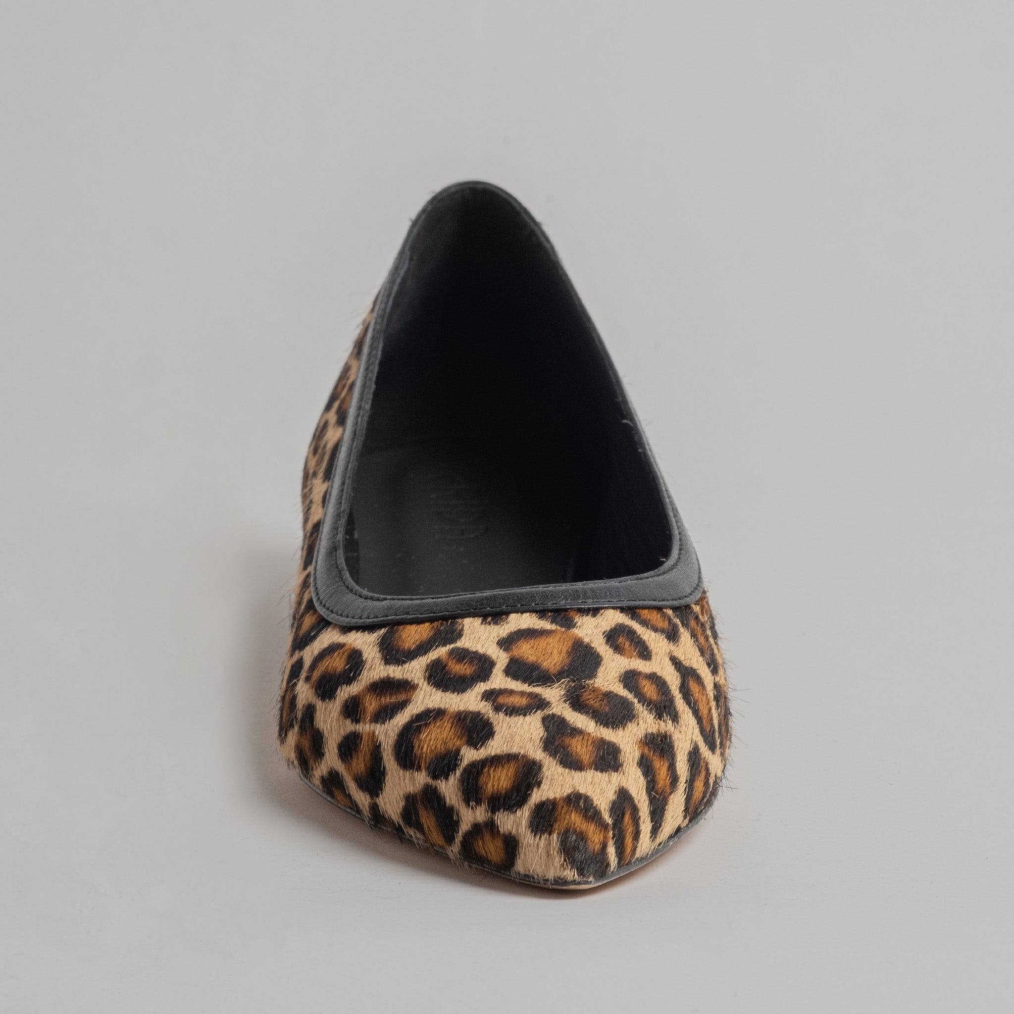 #colore_Cavallino maculato vera pelle e nappa nera